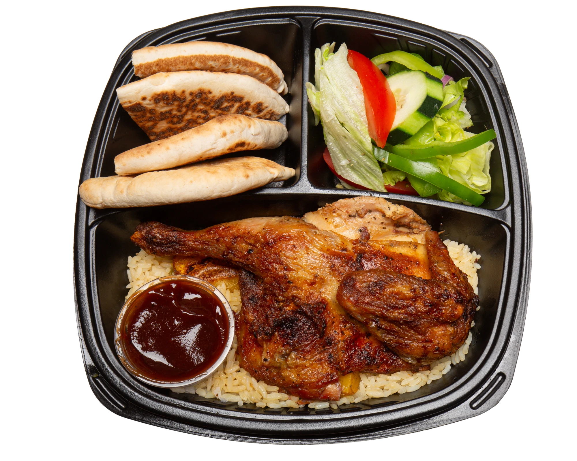 Rotisserie Greek chicken plate with rice, pita bread, salad, and sauce